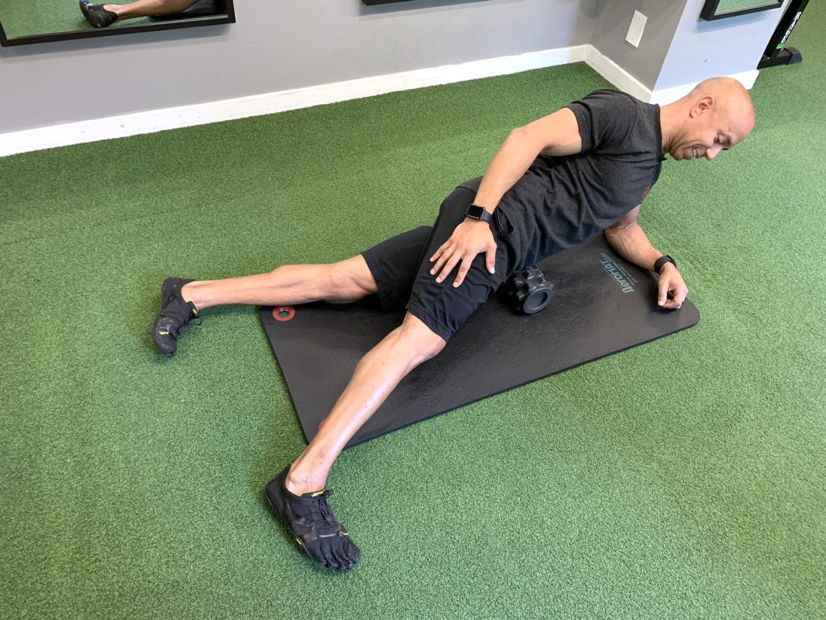 Adam Friedman Advanced Athletics Fitness Expert Demonstrates Rumble Roller Self Myofascial Massage For Mobility