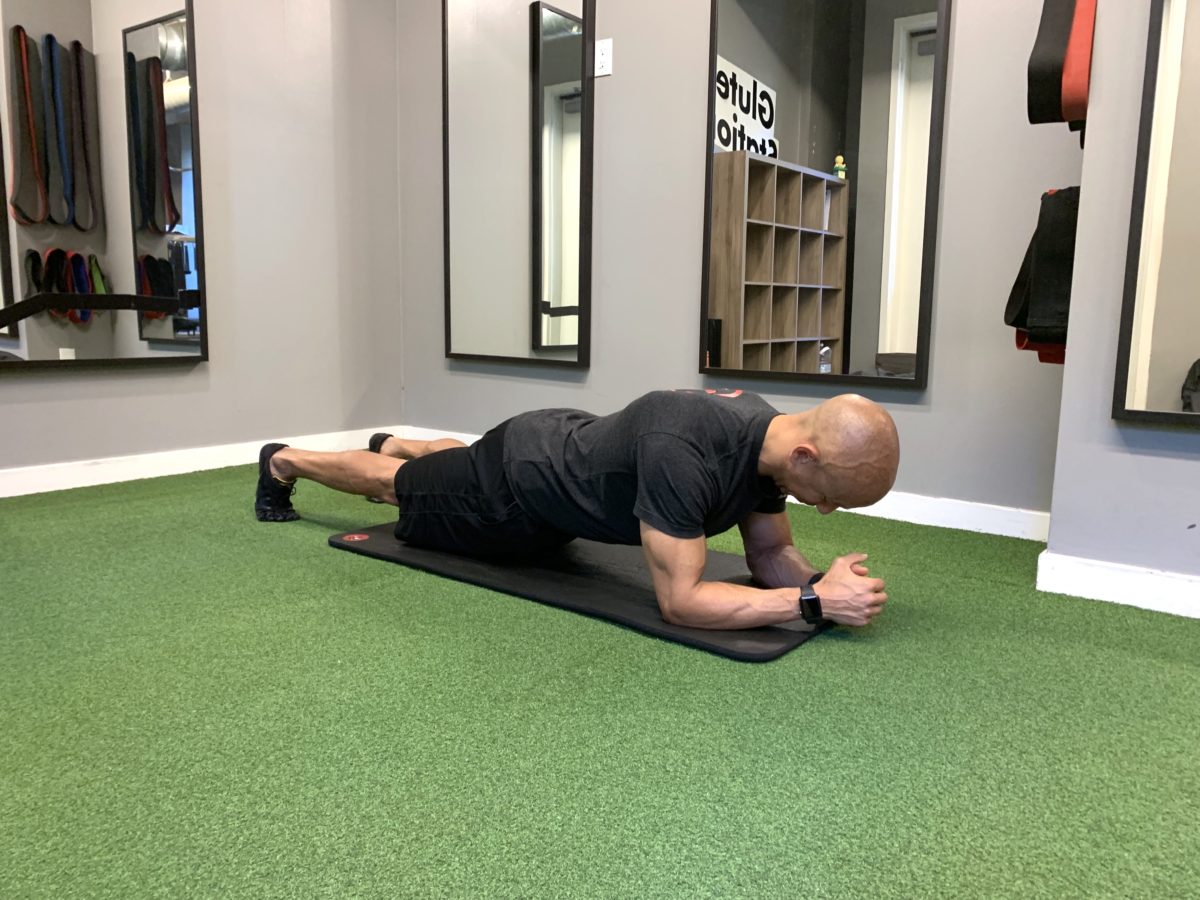 Adam Friedman Advanced Athletics Strength Coach Isometric Muscular Contraction Plank